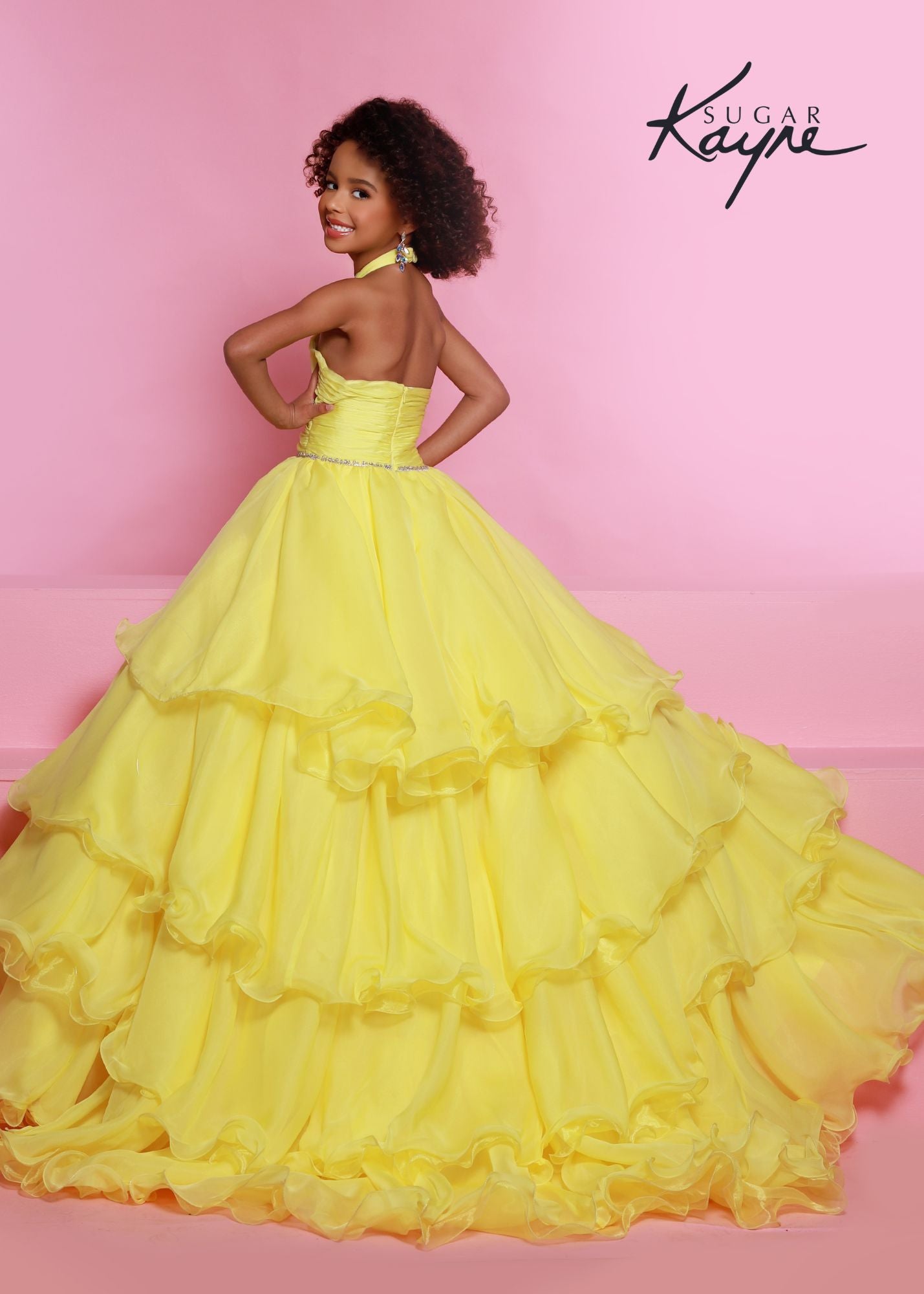 Sugar Kayne C305 Layer Girls Ruffle Pageant Ball Gown Cape Halter Formal Dress Oh s'cute!! This poly chiffon layered ballgown features a crisscross halter neckline with beaded trim along the waist. The train will float seamlessly across the stage, especially with the detachable cape.  Colors: Baby Blue, Lemon, White  Sizes: 2, 4, 6, 8, 10, 12, 14, 16  Fabric Poly Chiffon, Satin Lining