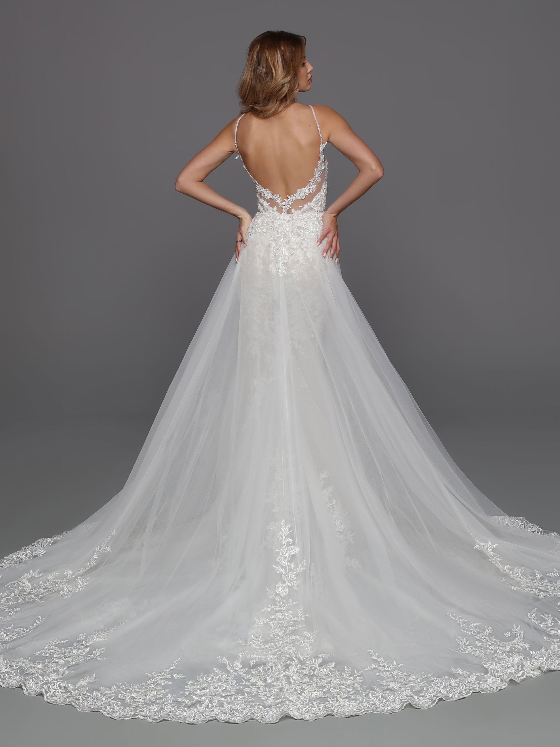 DaVinci Bridal 50720 Lace Wedding Dress Column Detachable Overskirt V Neckline Sheer Back  This is a long beautiful wedding dress with a deep v neckline and sheer panel.  The back is mid back and has sheer lace.  It is a long column bridal gown with a long train. 