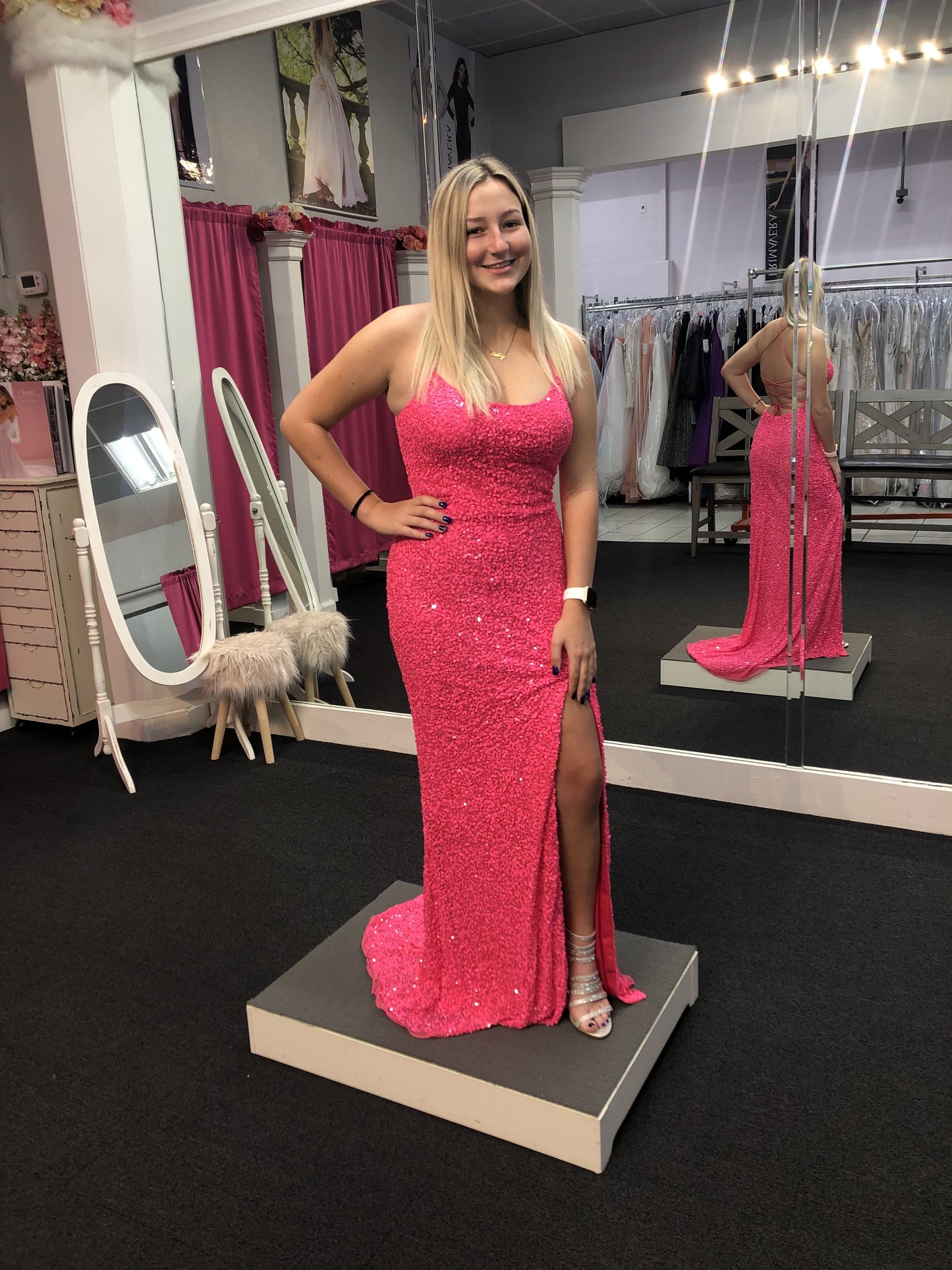 Primavera Couture 3290 This prom dress adds a pop to the multi sequins dress.  With a scoop neckline and spaghetti straps that cross and tie in the back.  This long evening dress has a side slit.  Available sizes:  000, 00, 0, 2, 4, 6, 8, 10, 12, 14, 16