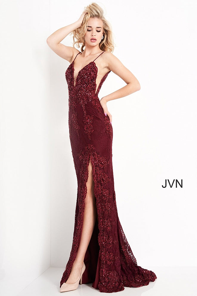 Jovani JVN00864 is an absolute stunner! Long Fitted Prom Dress or Unique Sexy Wedding Dress. Delicately Embellished Lace with a Plunging neckline & High Slit with scallop lace edges. Spaghetti straps with a slightly sheer lace bodice. JVN 00864