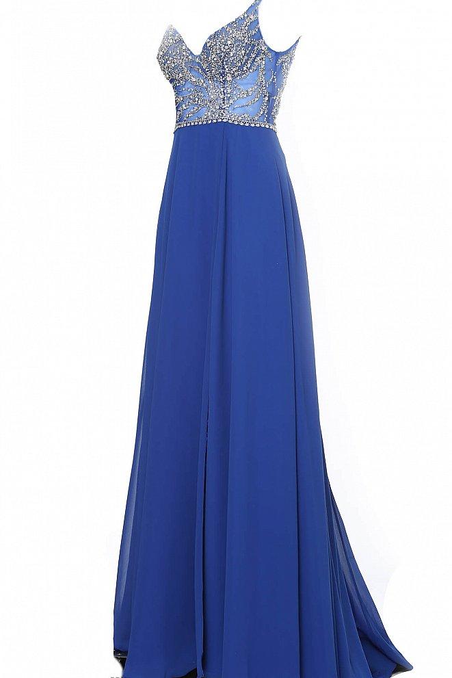 JVN4410 JVN 4410 is a long flowy pageant gown prom dress. Featuring a sheer embellished bodice and open back with with a V neckline and spaghetti straps. Flowing chiffon skirt with slit evening gown. 