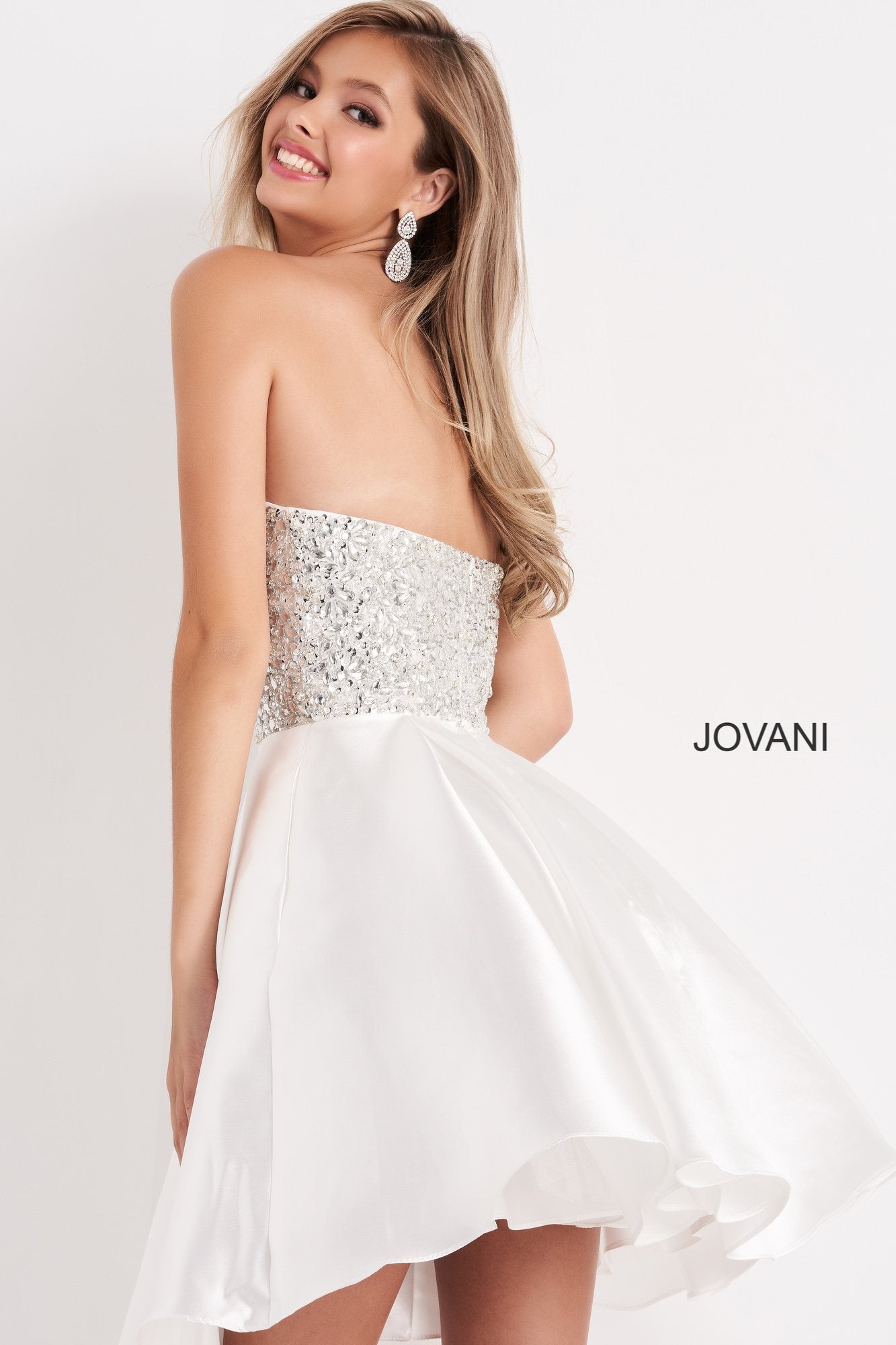 Jovani Kids k00722 is a short Girls Party Dress, Kids Pageant Gown & Pre Teen Formal Evening Wear gown. This Gorgeous Girls Fit & Flare Formal Cocktail Dress Features a strapless straight neckline with a fitted Crystal Embellished Bodice for a Stunning Glam Effect. Flared Short skirt is Pleated.