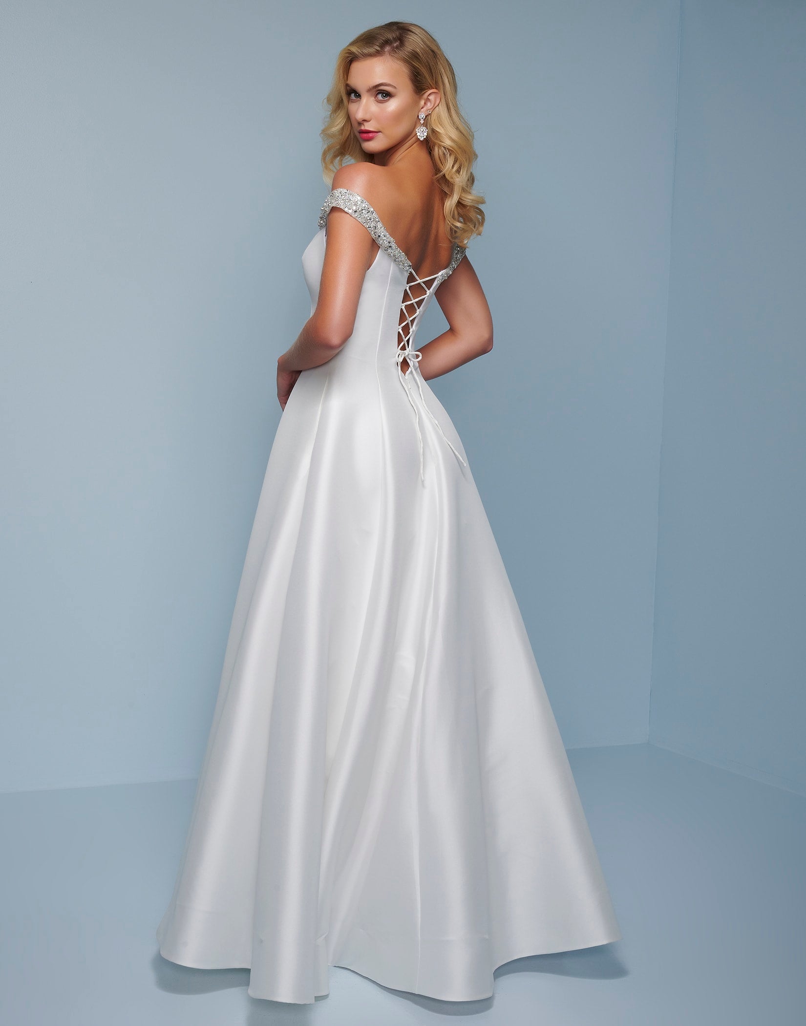 Splash Prom K524 This is an off the shoulder satin A line prom dress with embellished straps.  This long evening pageant gown is made of smooth satin and has an open lace up corset in the back.   Colors White  Sizes  6