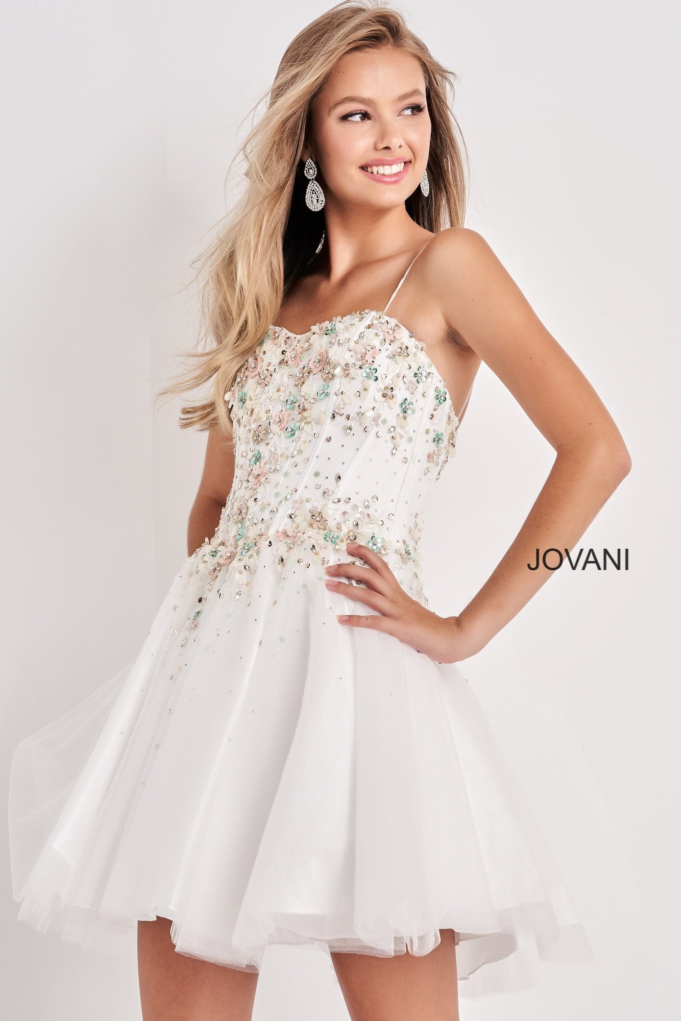 Jovani Kids K62532 Embellished Sweetheart Neckline Girls Party Dress.  Sweetheart neckline short girls Fit & Flare Cocktail Party Dress, Embellished Floral Applique & Beading along corset style bodice with boning. spaghetti straps. Flared tulle skirt.  Available Girls Sizes: 8, 10, 12, 14  Available Colors: White, Ice Blue