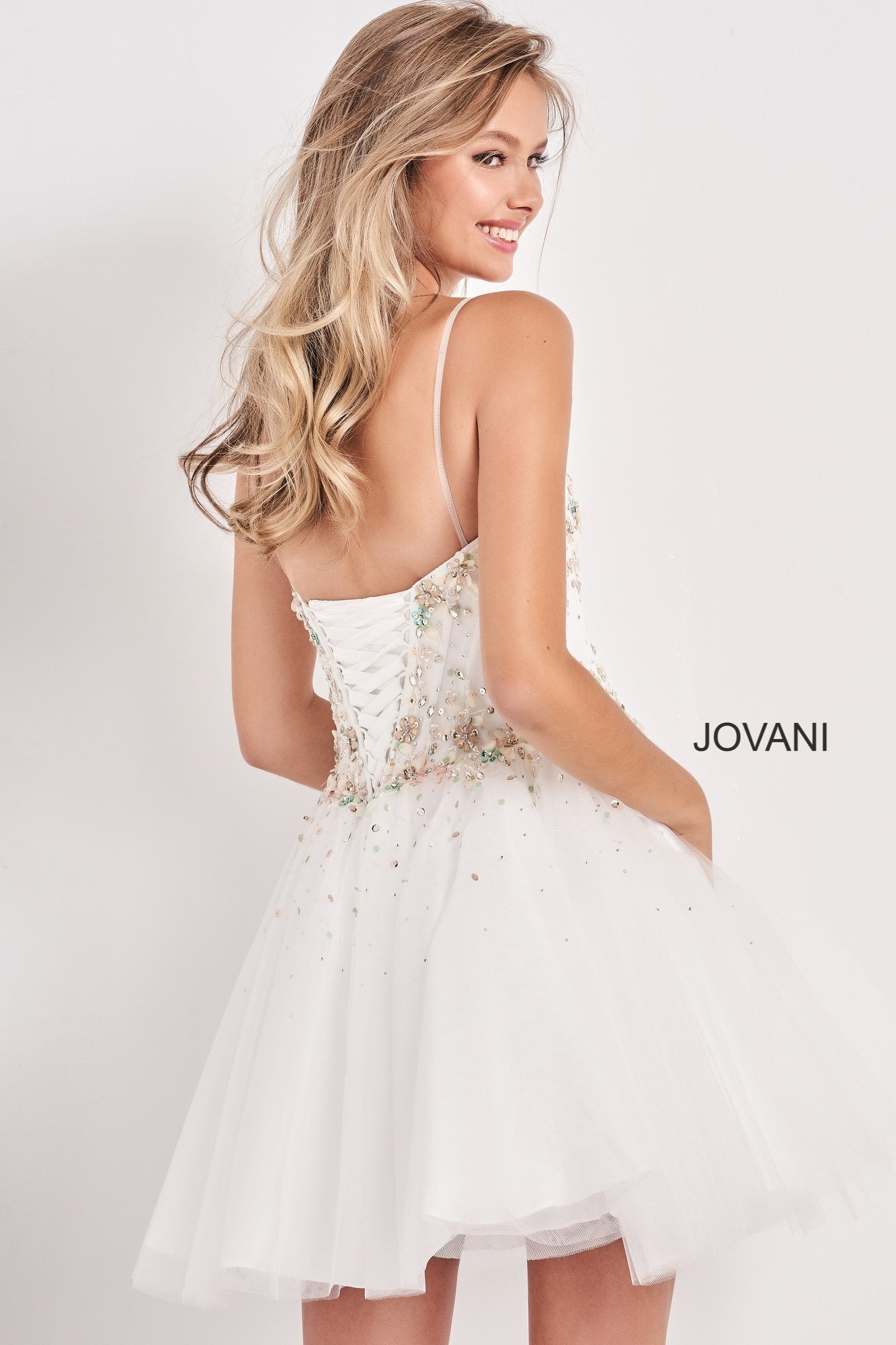 Jovani Kids K62532 Embellished Sweetheart Neckline Girls Party Dress.  Sweetheart neckline short girls Fit & Flare Cocktail Party Dress, Embellished Floral Applique & Beading along corset style bodice with boning. spaghetti straps. Flared tulle skirt.  Available Girls Sizes: 8, 10, 12, 14  Available Colors: White, Ice Blue