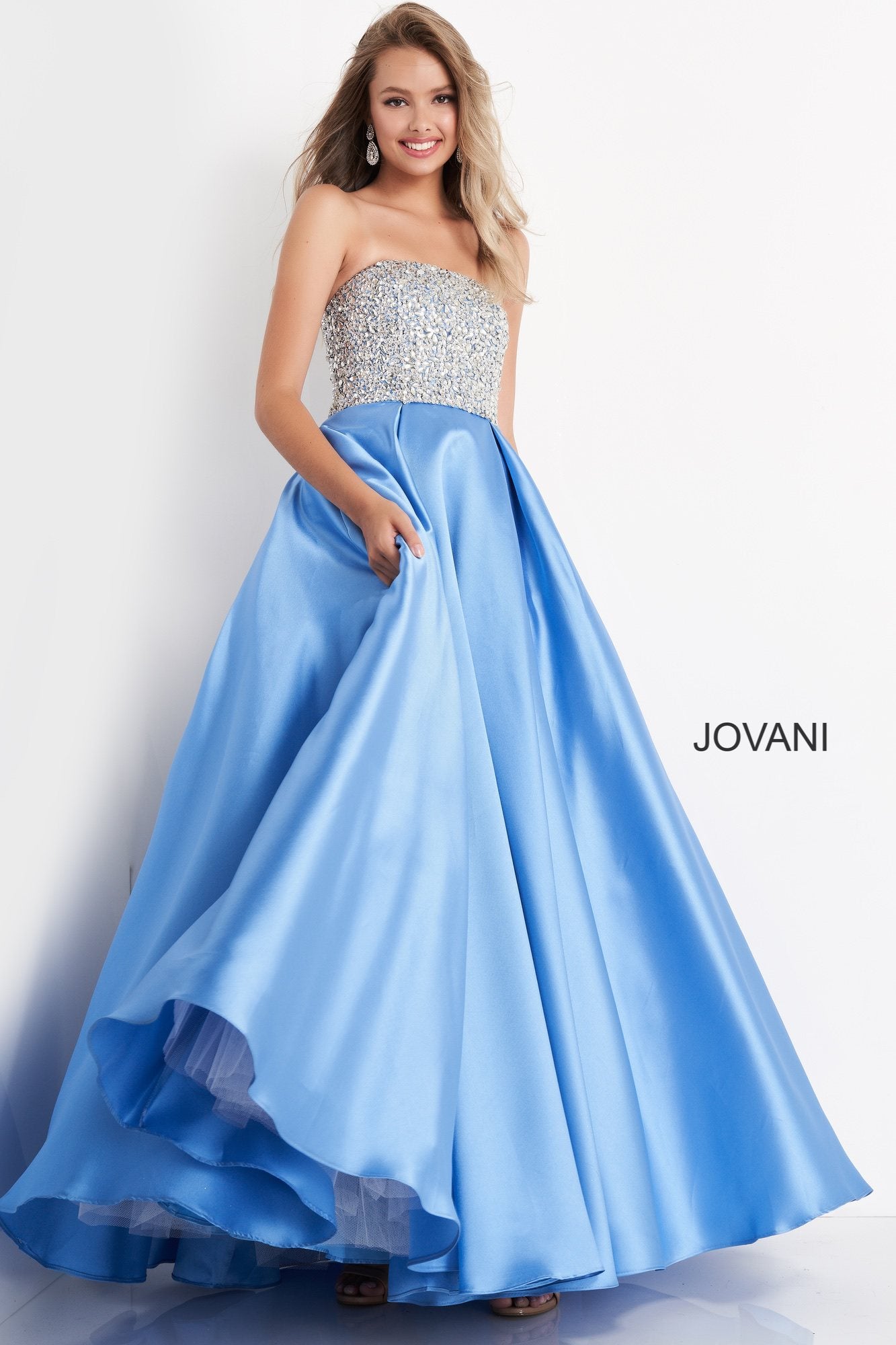 Jovani Kids k66689 is a Long Girls Party Dress, Kids Pageant Gown & Pre Teen Formal Evening Wear gown. This Girls Ballgown Features a Strapless straight neckline with a fitted bodice Embellished with Crystals & Rhinestones. A Line Pleated Ballgown Skirt - Floor Length. Great Girls Pageant Dress!  Available Girls Sizes: 8, 10, 12, 14  Available Colors: lilac, pink, silver, sky-blue, white