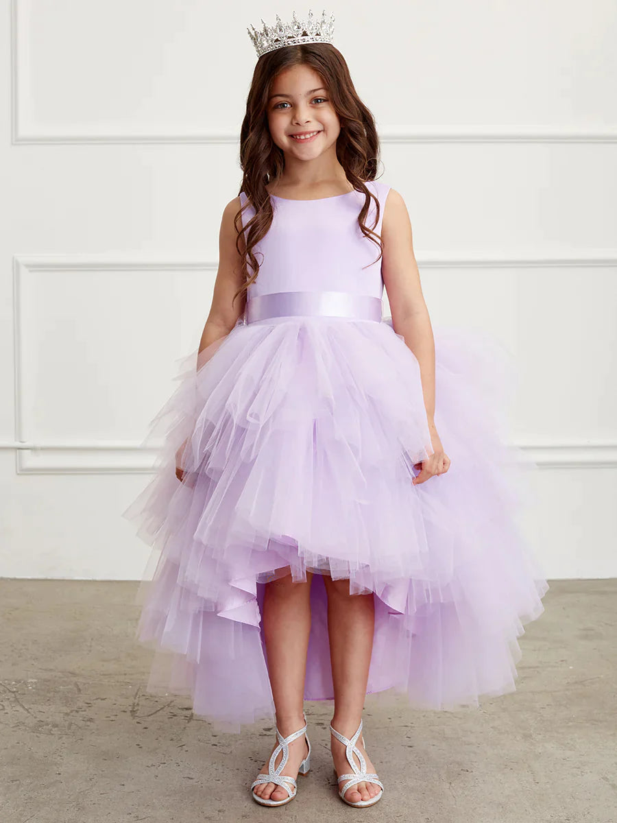 This Tip Top 5658 Girls Layered Tulle High Low Skirt Formal Dress is a perfect choice for that special day. The tulle high-low skirt, satin formal gown, and flower girl satin sash come together to create a beautiful, unique look perfect for flower girls, junior bridesmaids or formal occasions.  Sizes: 6M-16  Colors: Black, Blush, Burgundy, Eggplant, Ivory, Red, Royal Blue, White, Champagne, Lilac, Sky Blue