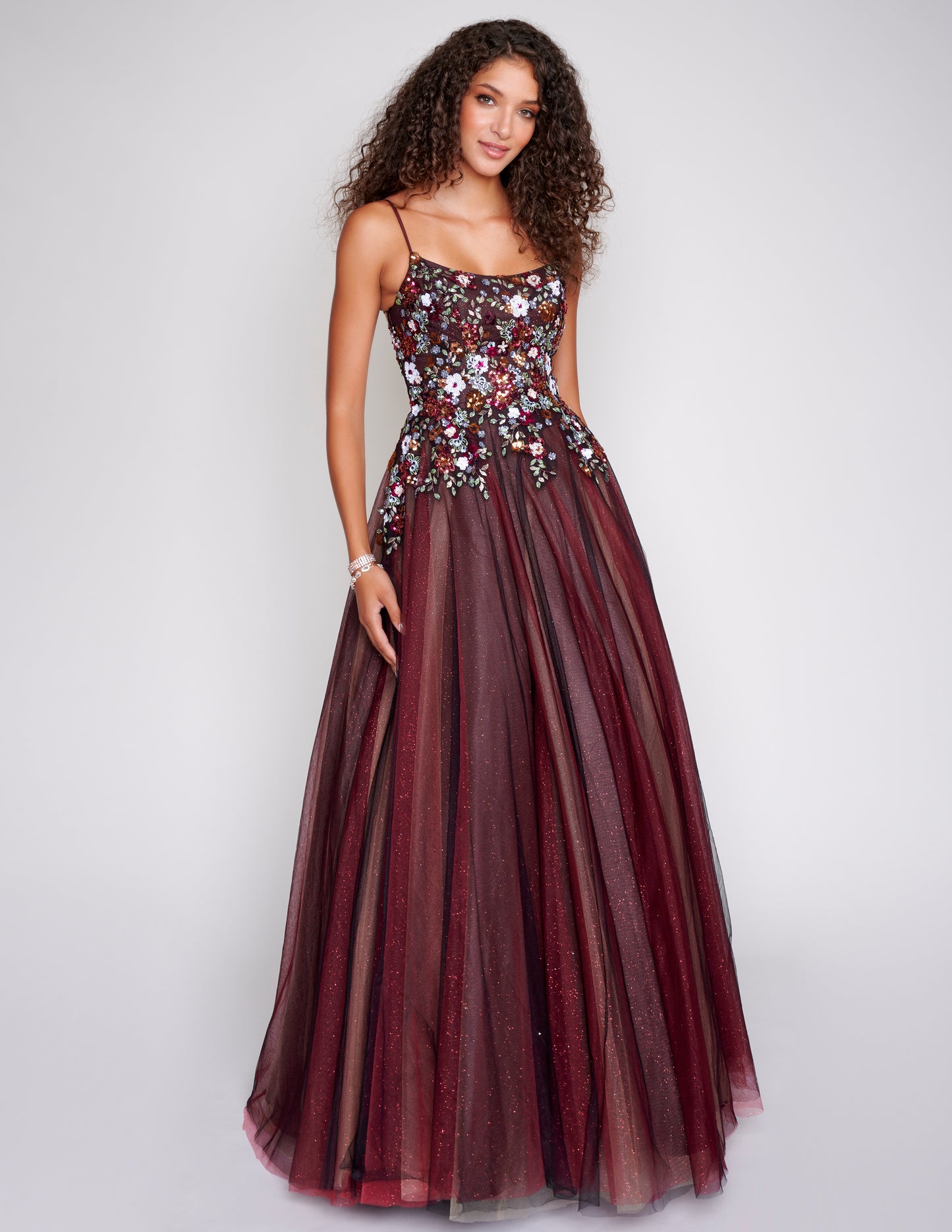 Nina Canacci 3206 Multi Colored Prom Dress Sequined Flower Top Tulle Ballgown Skirt  Colors:  Black Purple Multi, Black Red MultiElevate your evening with the Nina Canacci 3206 A Line Shimmer Lace Prom Dress. The tulle ball gown boasts a flattering A-line silhouette, scoop neck, and shimmer lace accents. Exude elegance and grace at your next formal event. Nina Canacci 3206 Multi Colored Prom Dress Sequined Flower Top Tulle Ballgown Skirt