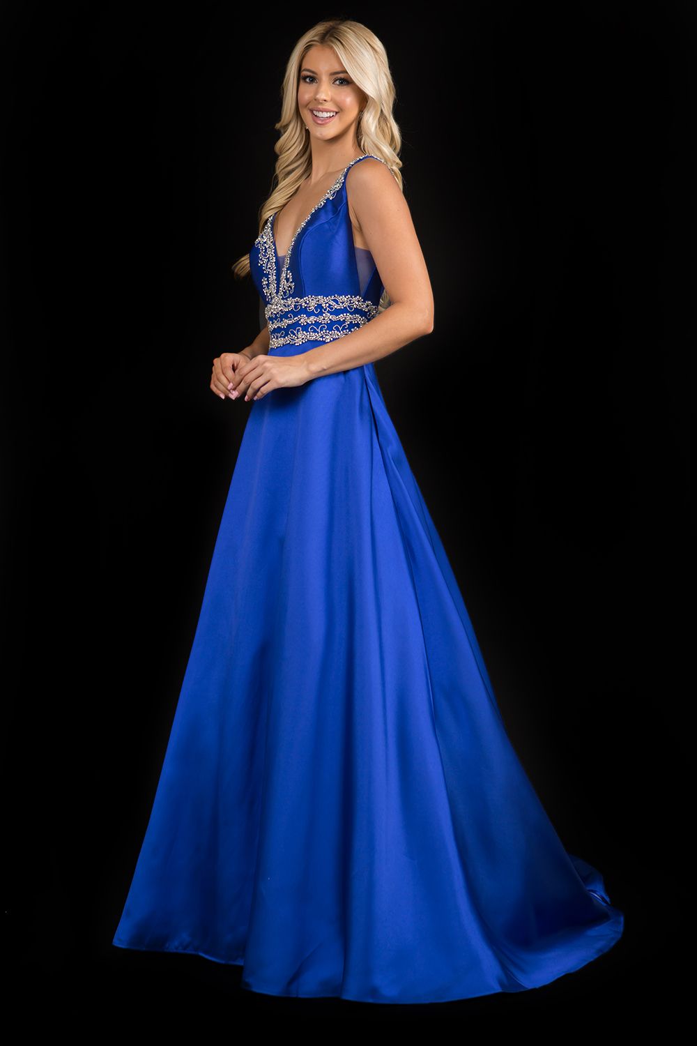 Nina Canacci 2290 Embellished plunging neckline A line prom dress embellished evening gown.  Three rows of embellishments around the waistline.  Colors:  Baby Blue, Ivory, Royal   Sizes:  8,10,12,14,16,18,20,22,24,