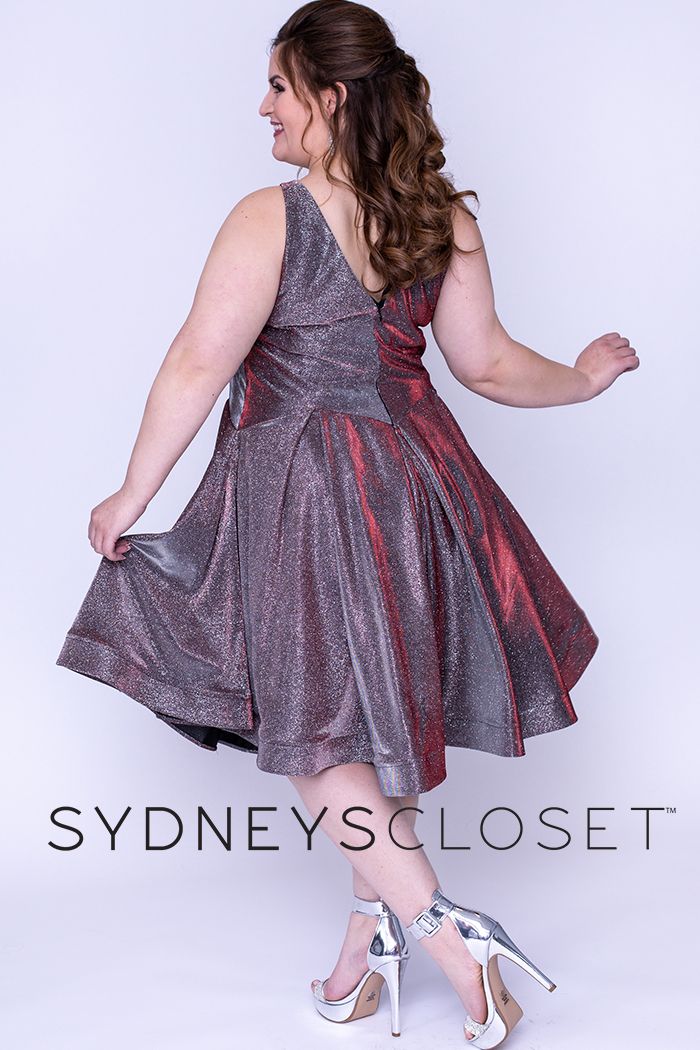 Sydney's Closet 8100 This is a super trendy plus sized V neckline holographic short formal cocktail dress that is knee length.  This short prom dress has wide straps and is bra friendly.  The homecoming dress has a basque waistline and pleated skirt with horsehair trim.  Colors  Cosmic Cobalt, Sonic Silver  Sizes  14, 16, 18, 20, 22, 24, 26, 28, 30, 32