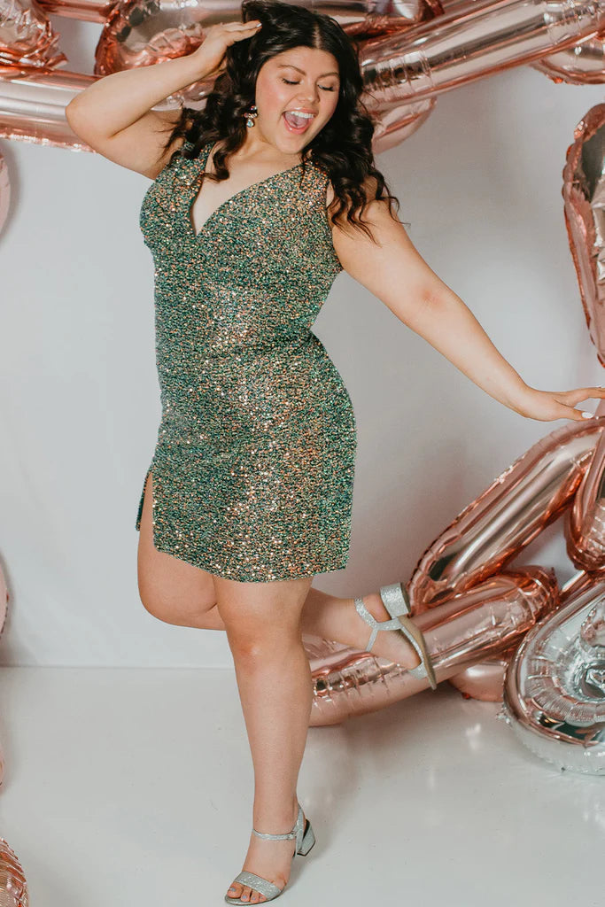 Sydneys Closet SC8110 Short Plus Size fitted Sequin Formal Cocktail Dress Slit gathered V Neckline Gown. Perfect for homecoming & Pageants! Colors: Blue Blitz, Firecracker Red, Green Surge Size Availability: 14-28 Multi-colored sequins Slim empire silhouette Above-knee Length V-neckline Sleeveless