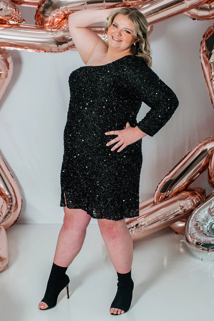 Sydneys Closet SC8112 Plus size Sequin One Shoulder Long Sleeve Cocktail Dress Formal Gown Colors: Hunter Onyx, Pearlescent, Ruby, Sapphire Size availability: 14-32 Fitted/Slim Silhouette Natural waistline One-shoulder Long sleeve Scoop neckline Slit on skirt Paillettes on stretch net Stretch knit lining