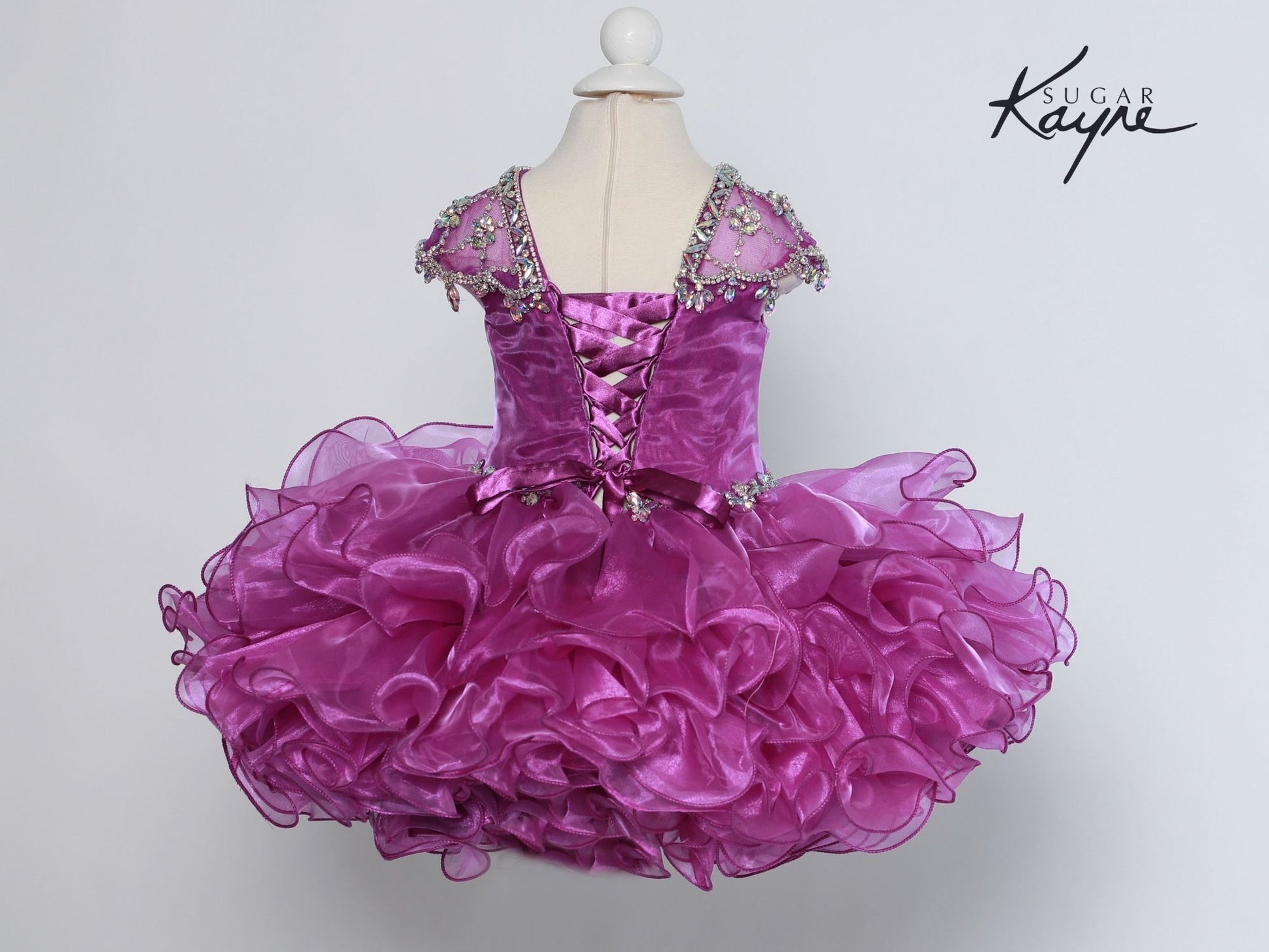 Sugar Kayne C204 Short Ruffle Cupcake Girls Pageant Dress Beaded Cap Sleeve Corset Gown  Sizes: 0M, 6M, 12M, 18M, 24M, 2T, 3T, 4T, 5T, 6T  Colors: Fire Red, Violet