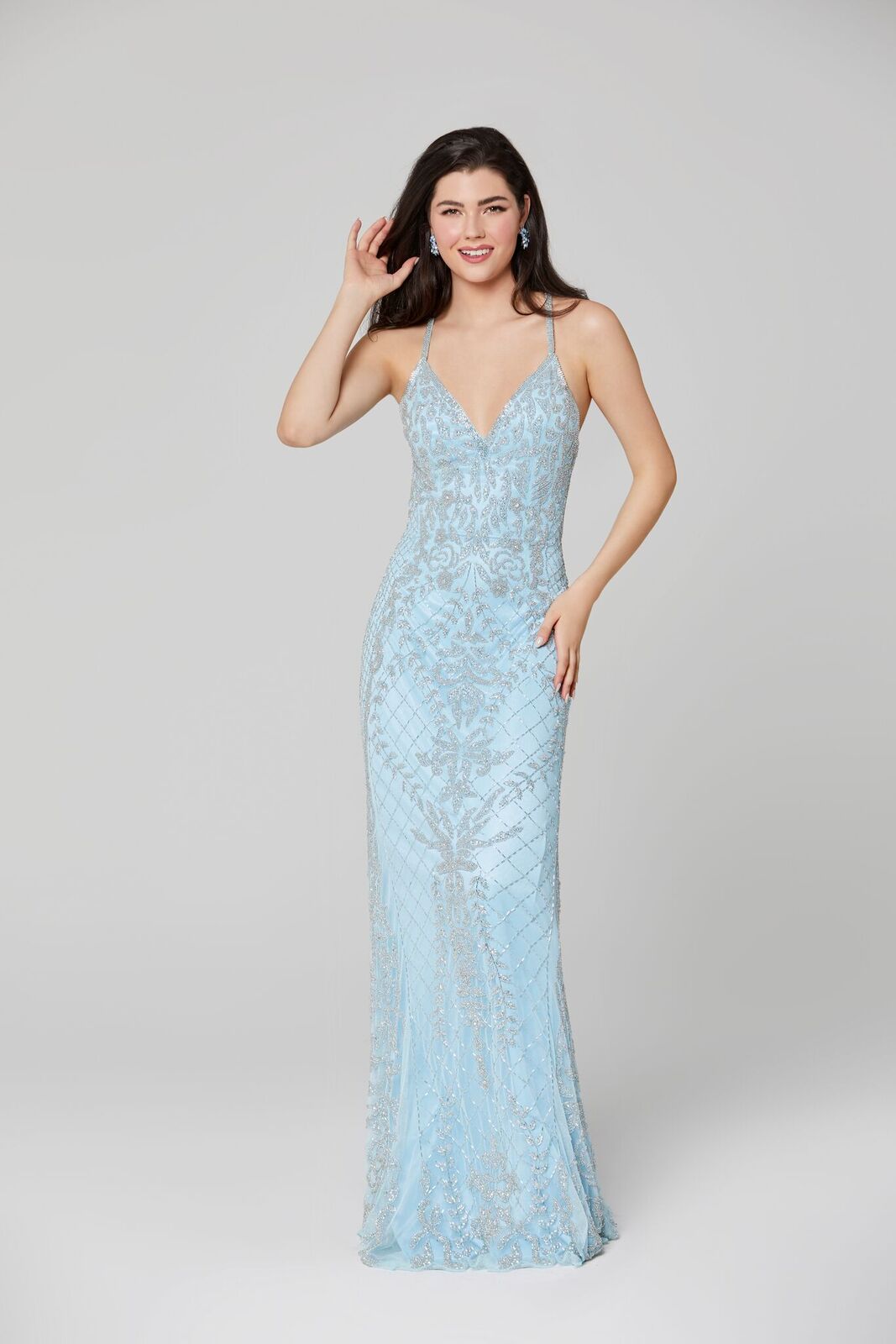 Primavera Couture 3428 is a embellished Prom Dress, Pageant Gown, Wedding Dress & Formal Evening Wear gown. This Gown Features a v neckline with spaghetti straps that criss cross in the open back pageant gown. 