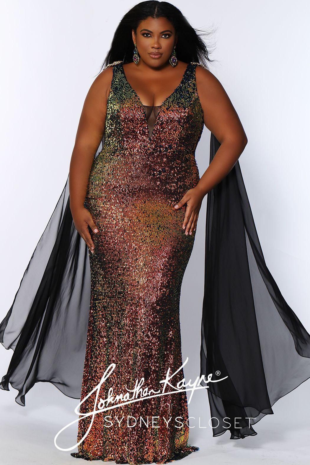 Johnathan Kayne for Sydney's Closet JK 2109 Aurora fitted plus sized sequin mermaid prom dress with shoulder capes.  The flowy scarves on this pageant gown are detachable.  This long evening gown has a plunging v neckline with a mesh panel.   JK2109