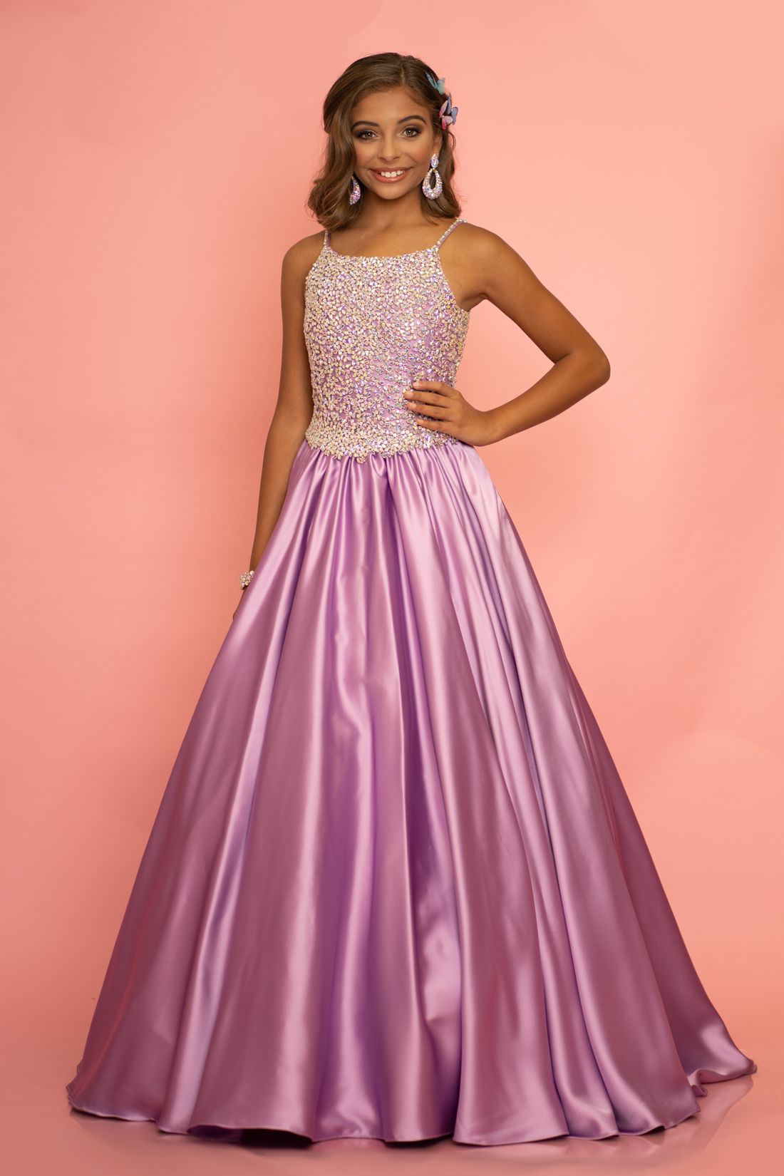 Sugar Kayne C134 by Johnathan Kayne Girls and Preteens long pageant gown with stone encrusted bodice with and embellished spaghetti straps.  The full ballgown skirt is made of Duchess Satin and has a sweeping train.  Available colors:  Hot Coral, Orchid, White  Available sizes:  2, 4, 6, 8, 10, 12, 14, 16 