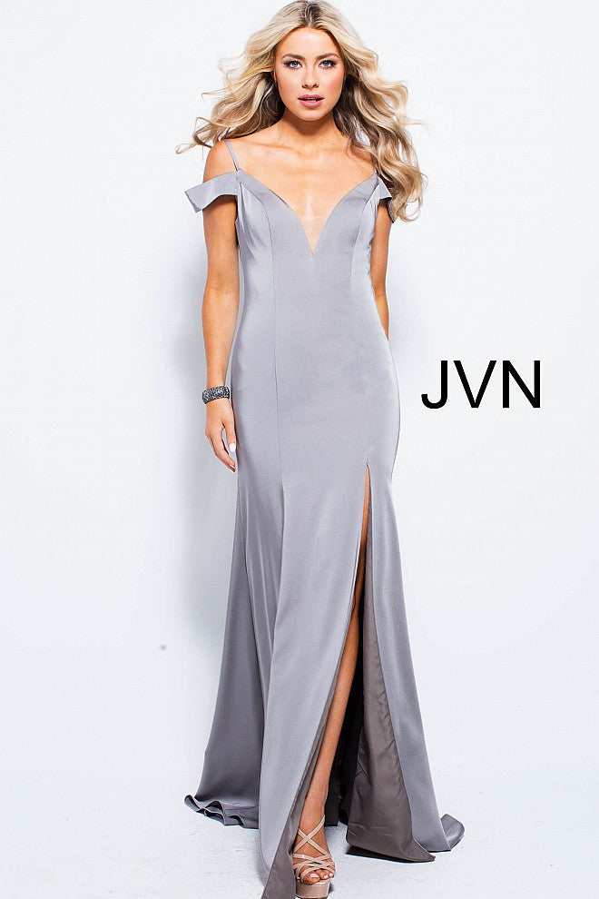 The JVN57297 prom dress from JVN by Jovani features an off the shoulder design and a side slit in a rich Burgundy color. This floor length dress includes a train, form fitting bodice, plunging neckline with a sheer mesh insert, and spaghetti straps over the shoulders. The V back adds an elegant touch to this stunning gown.