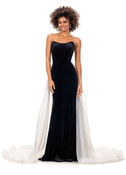 Ashley Lauren 11311 This stunning velvet gown features a sweetheart neckline with an organza overskirt. The overskirt is embellished with scattered crystals that cascade down the skirt. Strapless Bustier Crystal Details Stretch Velvet Organza Overskirt COLORS: Navy/Sky, Black/Ivory