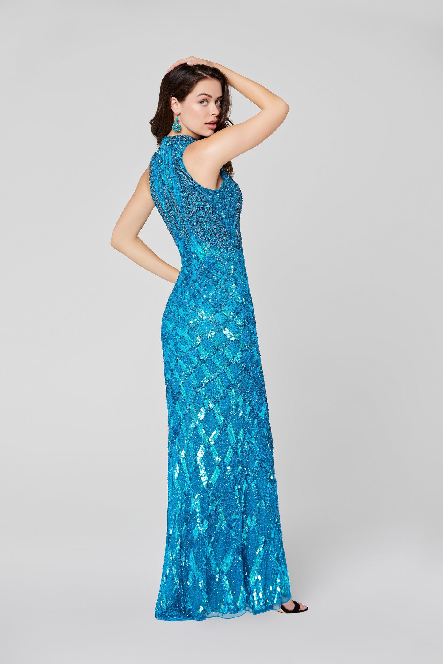 Primavera Couture 3442 high neckline and high back sleeveless fully beaded sequins evening gown.  Beaded High Neckline Prom Dress Formal Evening Gown.  Available colors:  Peacock  Available sizes:  18